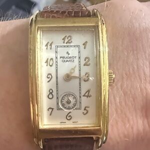Peugeot Gold curvature Watch with Brown leather Strap